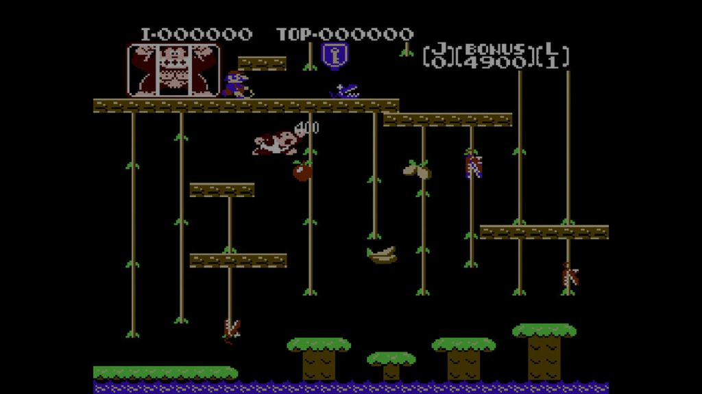 Donkey Kong Jr. - Jump to catch that fruit! Watch out for the bad Mario who has captured your dad!