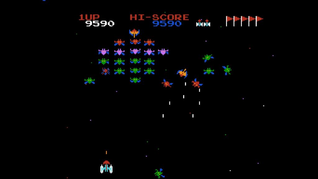 Galaxian - Notice all the enemies that are coming after me. More than one ship will break from formation at once.