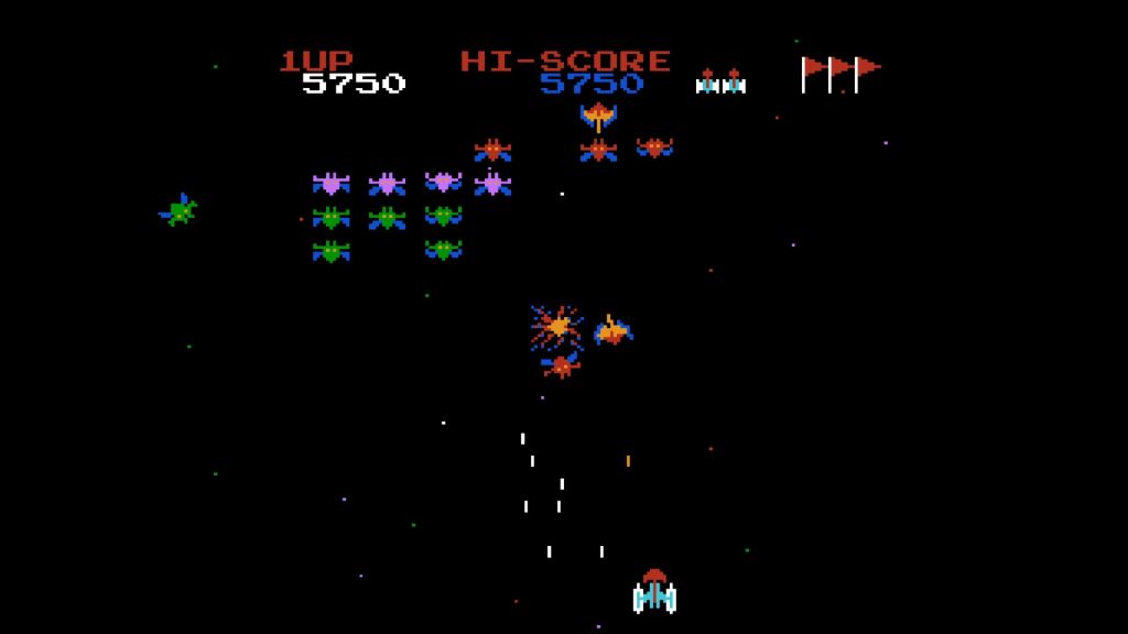 Galaxian - Three aliens can attack in unison at certain points. Be careful!