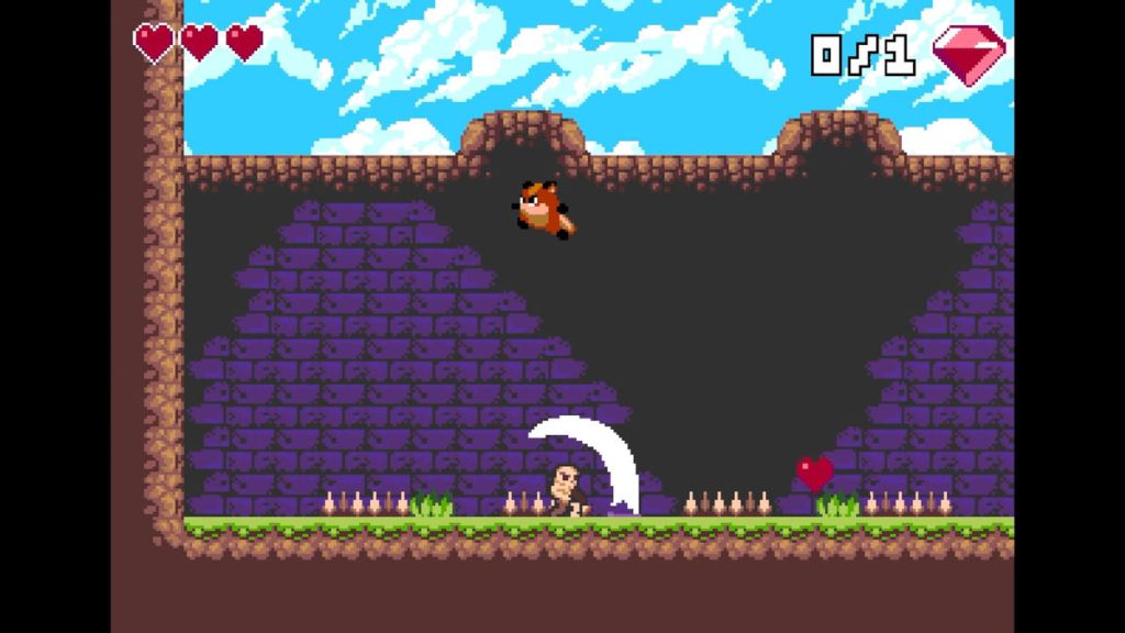 FoxyLand - Taking on the first boss. If he gets his axe stuck in the ground you can jump on him to hurt him.