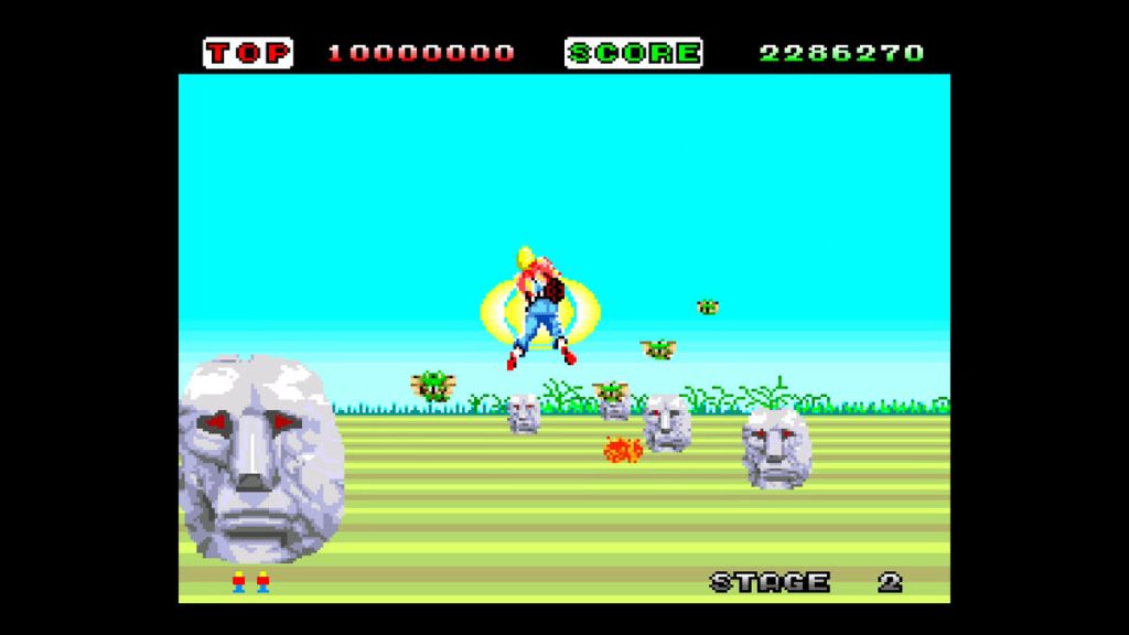 Space Harrier (TG-16) - The high number of sprites is pretty impressive in stage 2, but the amount of foliage drops sometimes.
