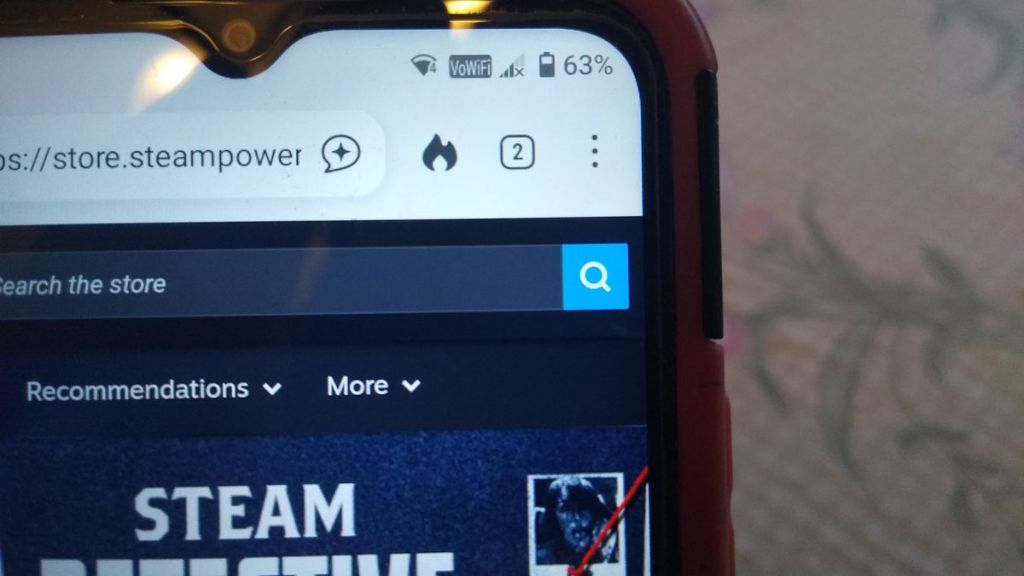 Steam on a Phone - 4) Near the top of the screen you will see a magnifying glass. Tap on it.