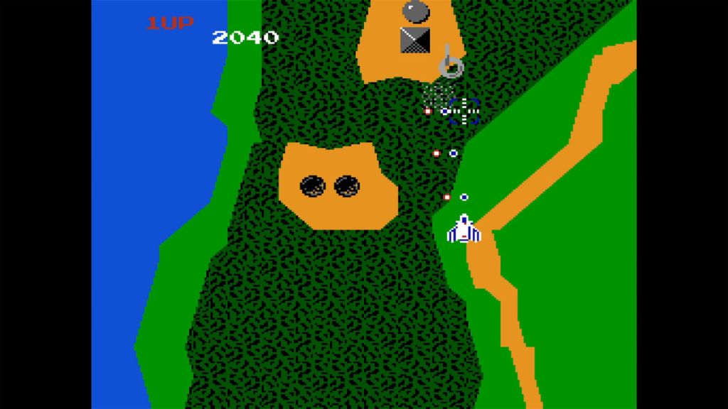 Xevious - A typical shot of the game. Those circular UFOs are one thing I think about with this title.