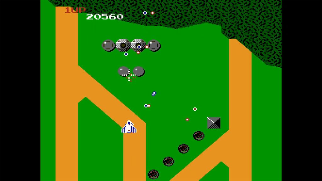 Xevious - Now things are starting to get difficult. If you know the turrets are coming you can blast them early so they can't fire at you anymore.
