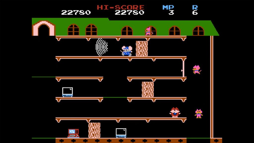 Mappy (NES) - A typical image of gameplay. Now that we are later in the game the cats can run along in the attic now.